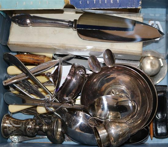 A silver kiddush cup, a small silver cream jug, a silver capstan inkwell and a quantity of plated flatware.